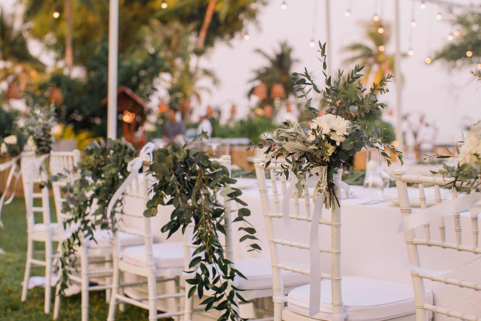 Wedding chair decorated with flowers.